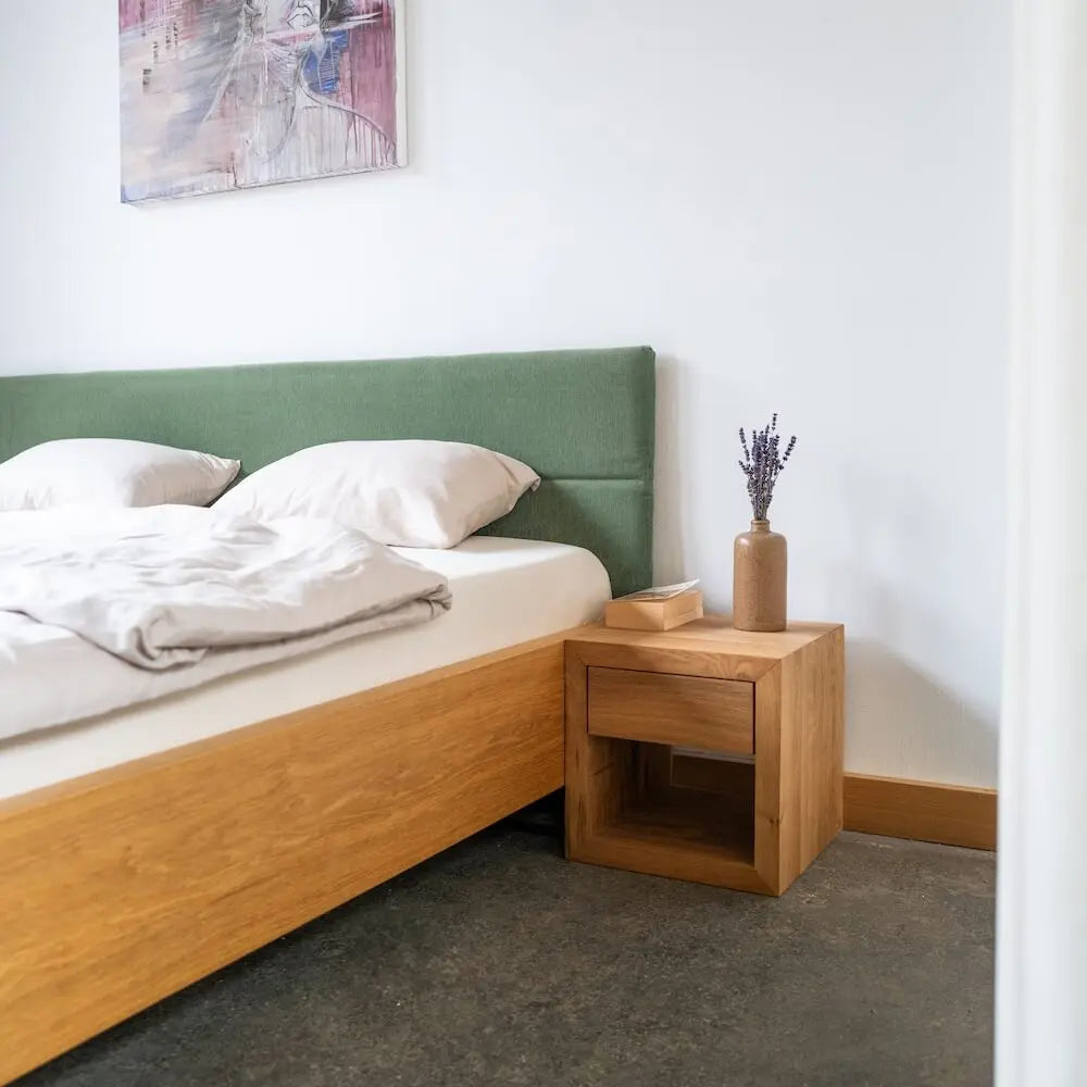 Bett "Kufen" aus Eiche mit Bohlentextilkopfteil - Image #8